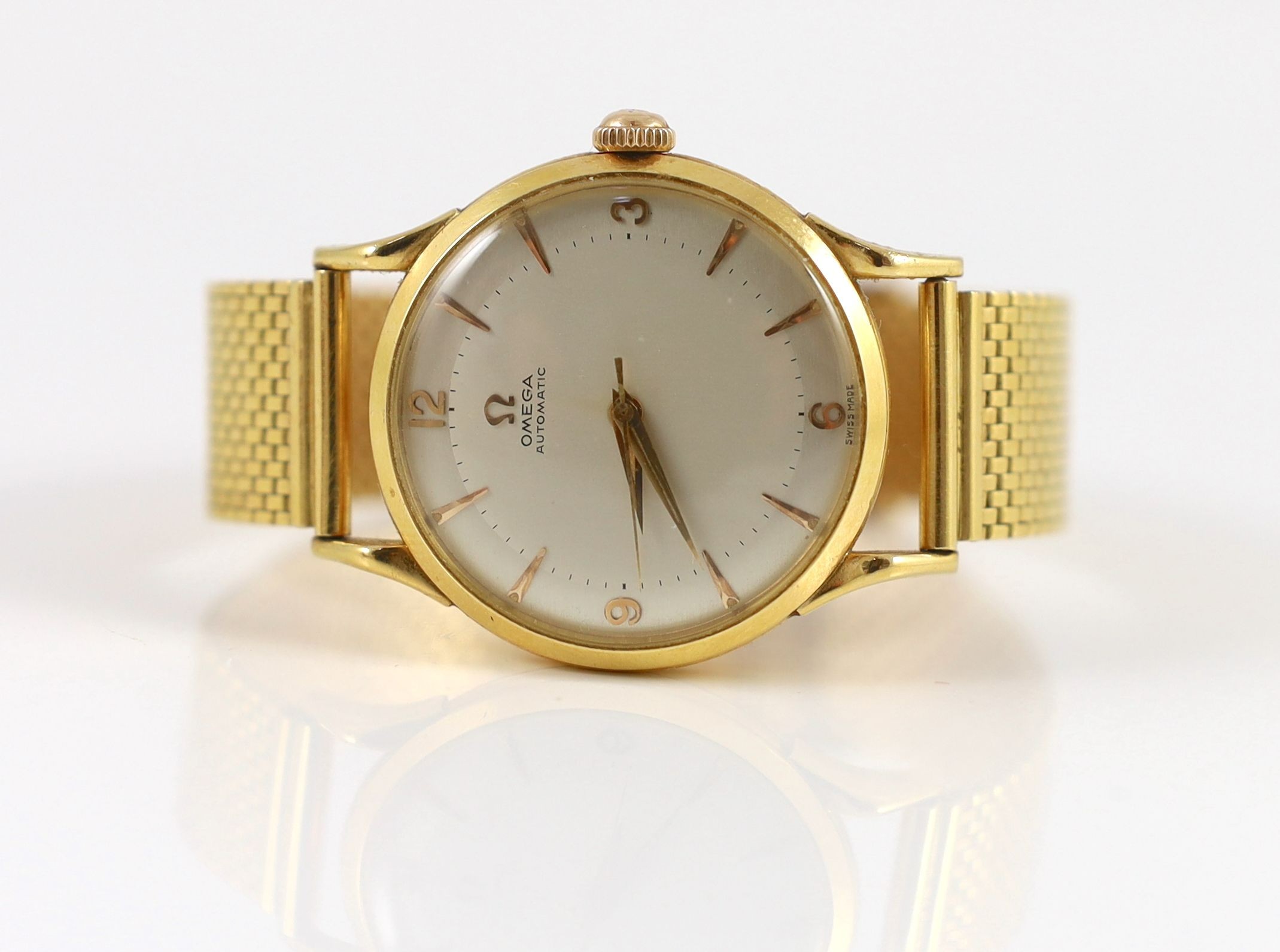 A gentleman's 1950's 18ct gold Omega Automatic wrist watch